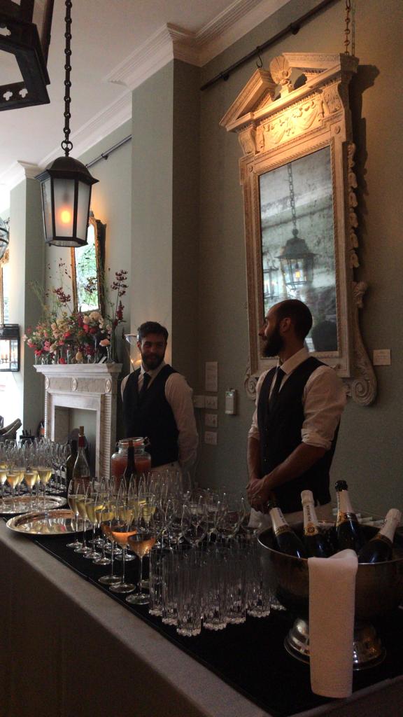 Quiet before the storm at the bar of the Jamb pimlico road party.