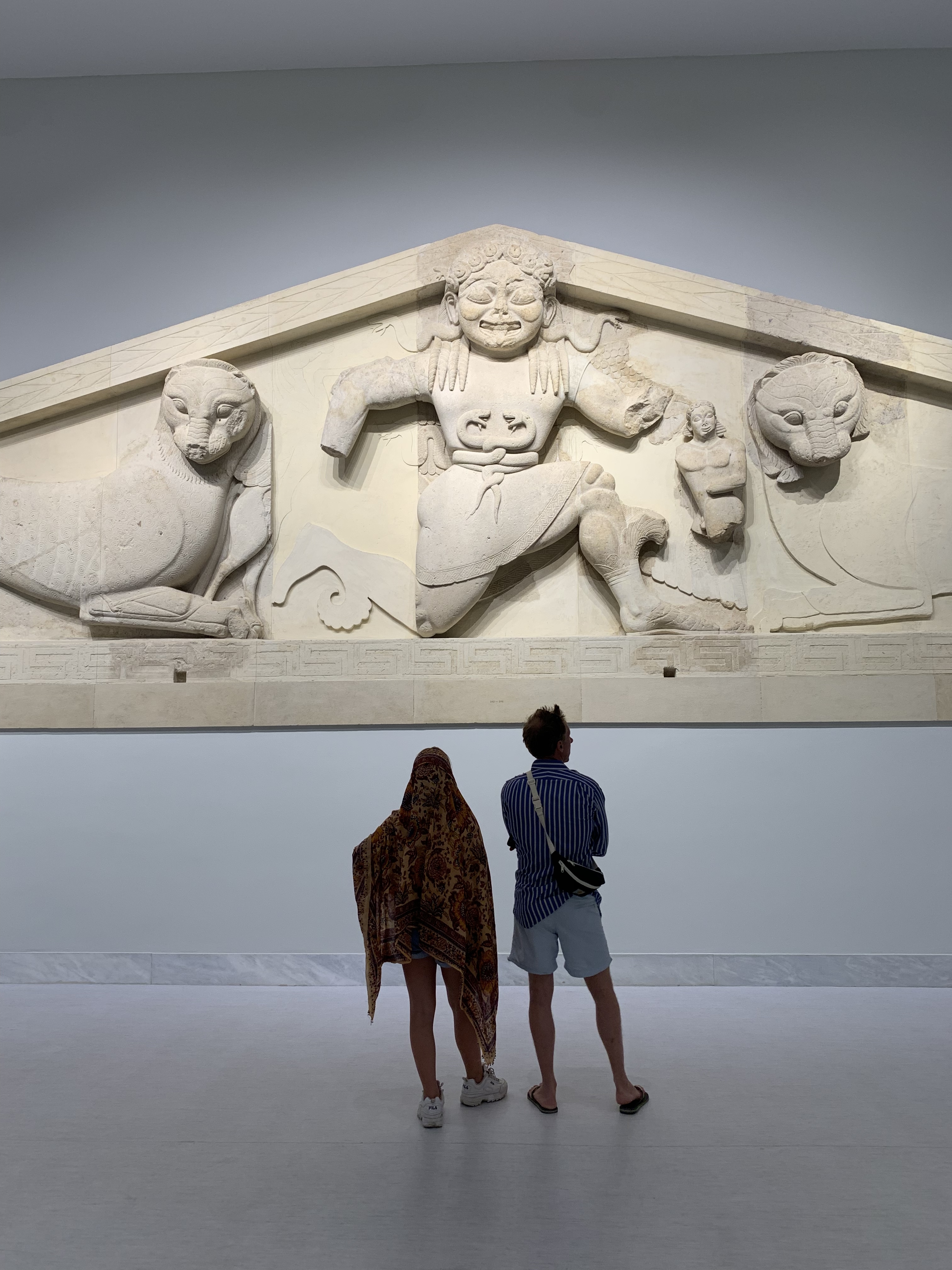 Gazing at the wonder of the western pediment.