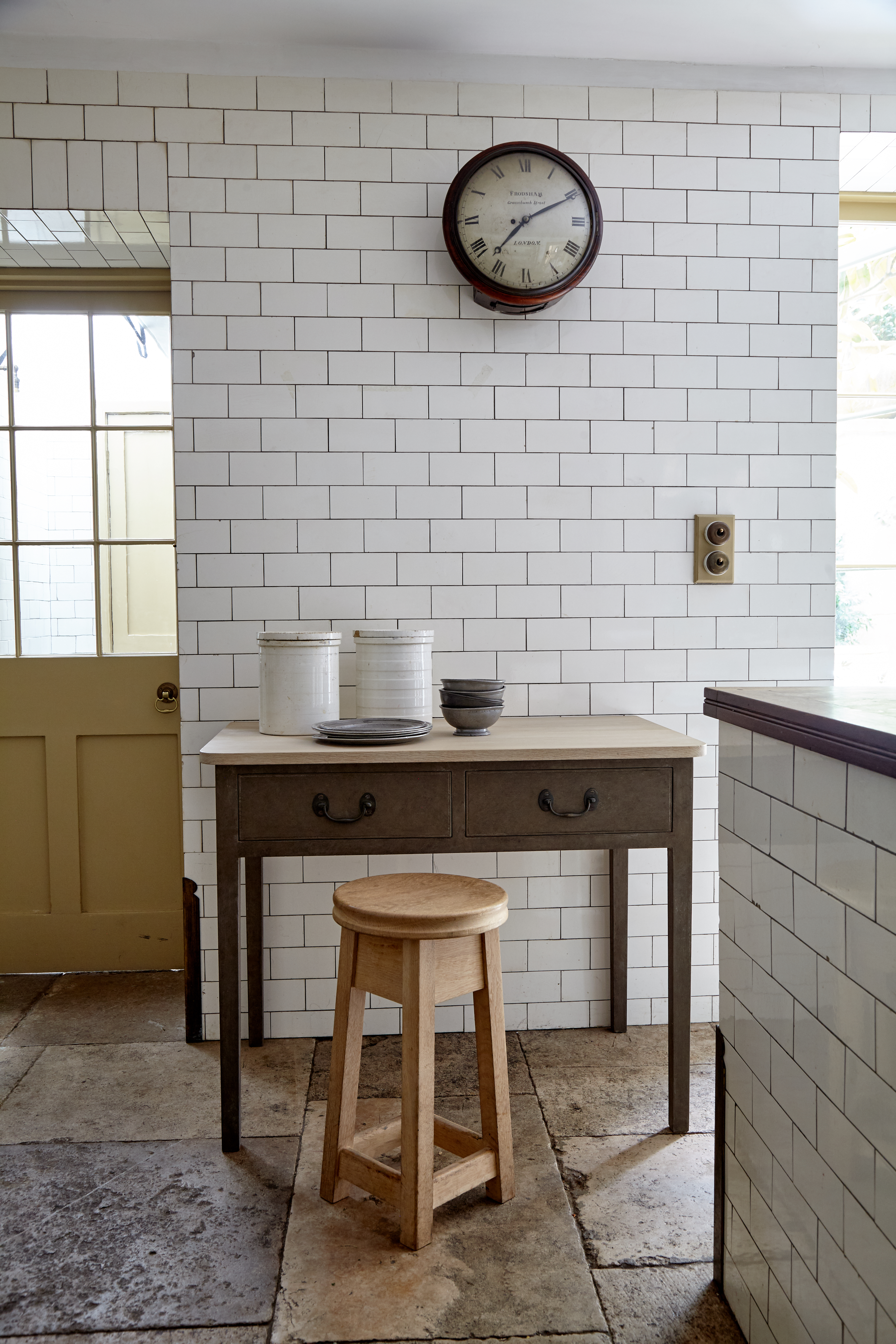 The Harewood table with a Carrara marble top.